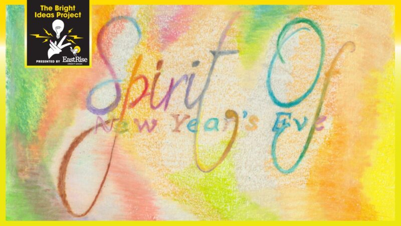 Watercolor painting of green, pink, yellow and blue. The words "Spirit of New Years Eve" is written in watercolor across the middle.