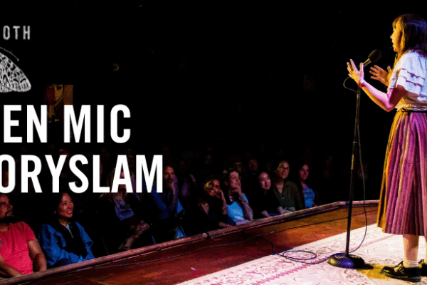 Image of a woman storytellilng on stage in front of an audience